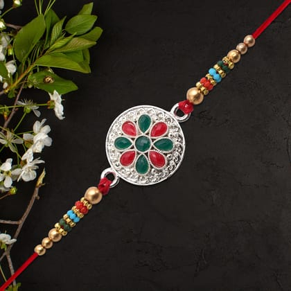 DHRUVINSRI Lucky Jewellery Designer Silver Plated Red Green Stones Floral Rakhi - Rakshabandhan Rakhee Bracelet for Brother bhaiya bhai bhabhi - Pack of 1