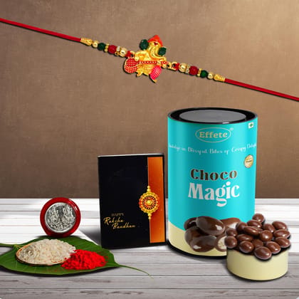 Designer Ganesh Ji Rakhi for Brother with Choco Coated Nut Chocolate , Pooja Coin, Roli Chawal & Card-1 Pack of 4 items)