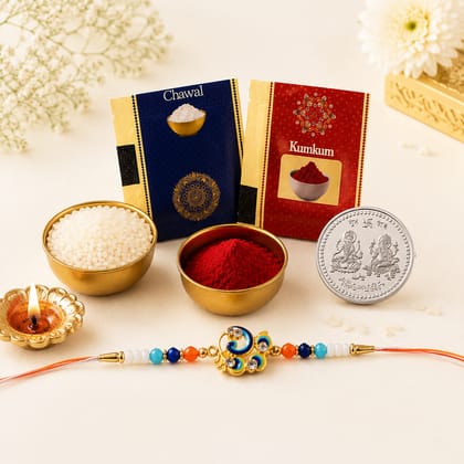 DHRUVINSRI 4pcs Designer Peacock Feather Rakhi Tilak Set Combo - 1 Designer Rakhi, 1 Laxmi Ganesha Coin, 2Pcs Tilak Pouches