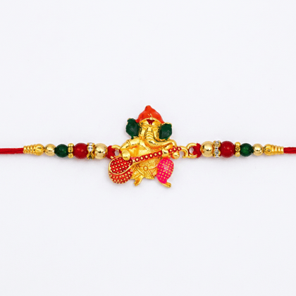 Designer Ganesh Ji Rakhi for Brother with Choco Coated Nut Chocolate , Pooja Coin, Roli Chawal & Card-1 Pack of 4 items)