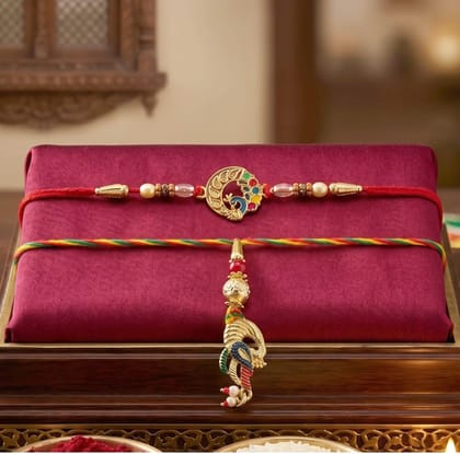 DHRUVINSRI 5 Pcs Premium Peacock Charm Bhabhi Lumba Rakhi With Laxmi Ganesh Coin, Tilak Kit, Assorted fruit Pack– Elegant Maroon Gift Box for Rakshabandhan